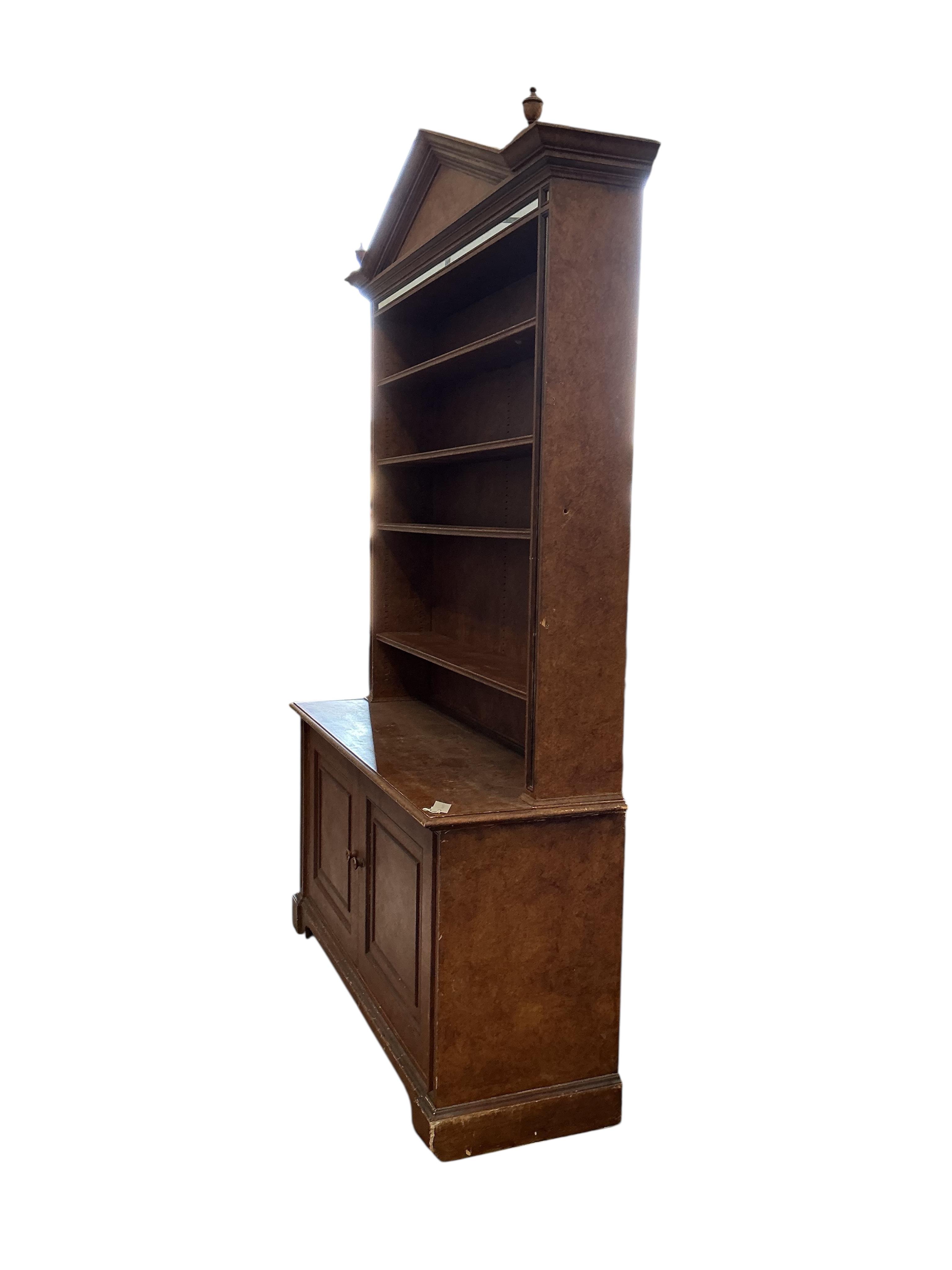 A reproduction George III style oak open library bookcase with painted simulated grain, width 144cm, depth 48cm, height 237cm